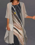 Vestido midi estampado beige con cuello redondo y manga corta