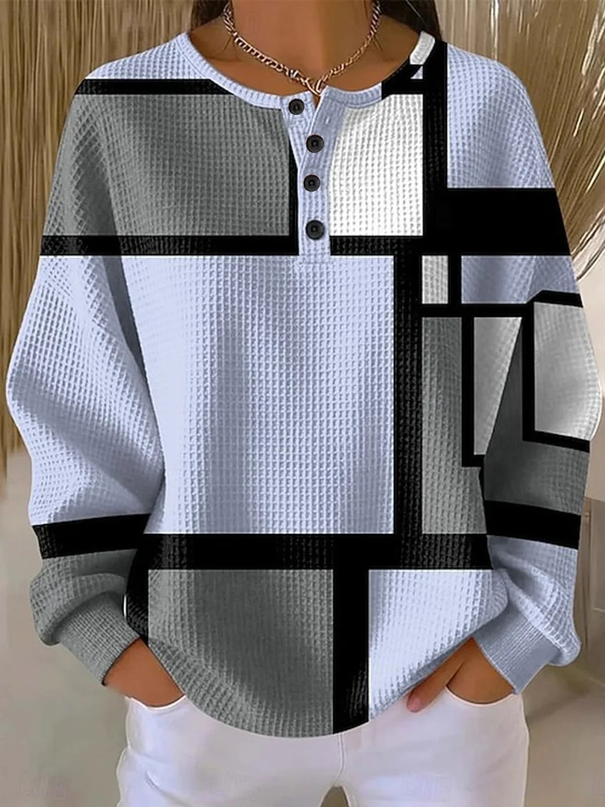 Sudadera geométrica de tejido gofre con cuello henley
