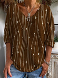 Blusa casual abstracta con escote en pico y manga larga