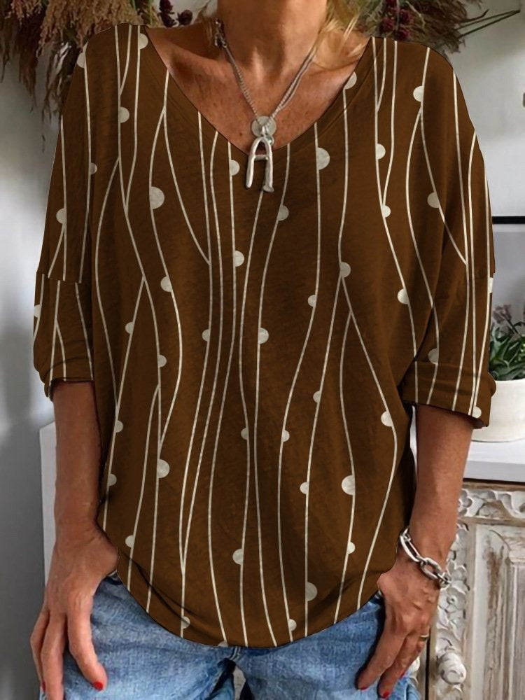 Blusa casual abstracta con escote en pico y manga larga