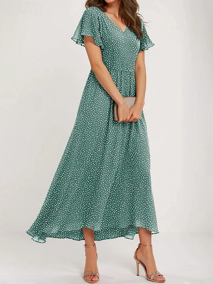 Vestido cómodo largo de lunares verde con escote en pico y manga corta