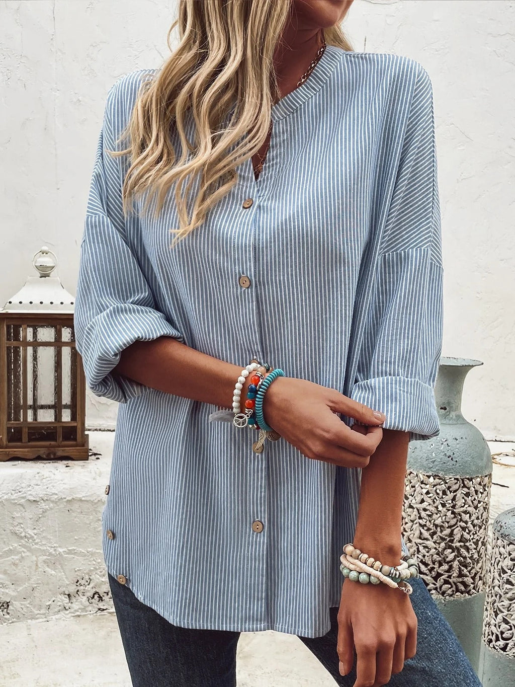 Blusa holgada de rayas con cuello camisero y manga larga · Vera