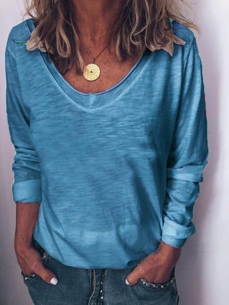 Blusa básica lisa con cuello redondo y manga larga