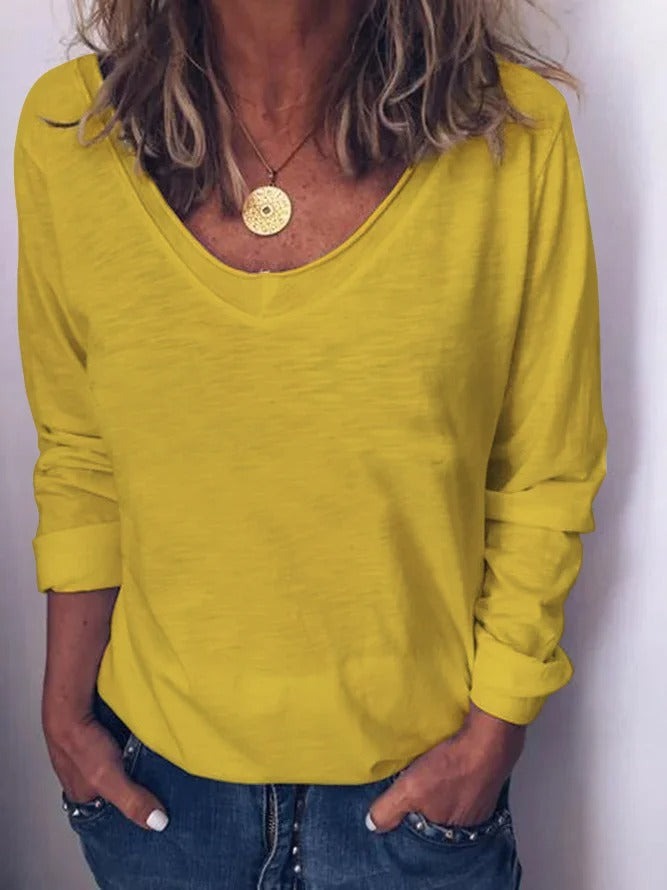 Blusa básica lisa con cuello redondo y manga larga