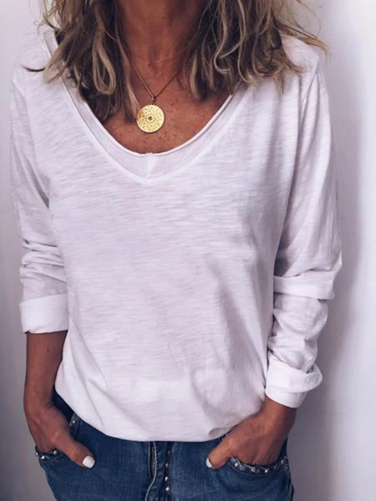 Blusa básica lisa con cuello redondo y manga larga