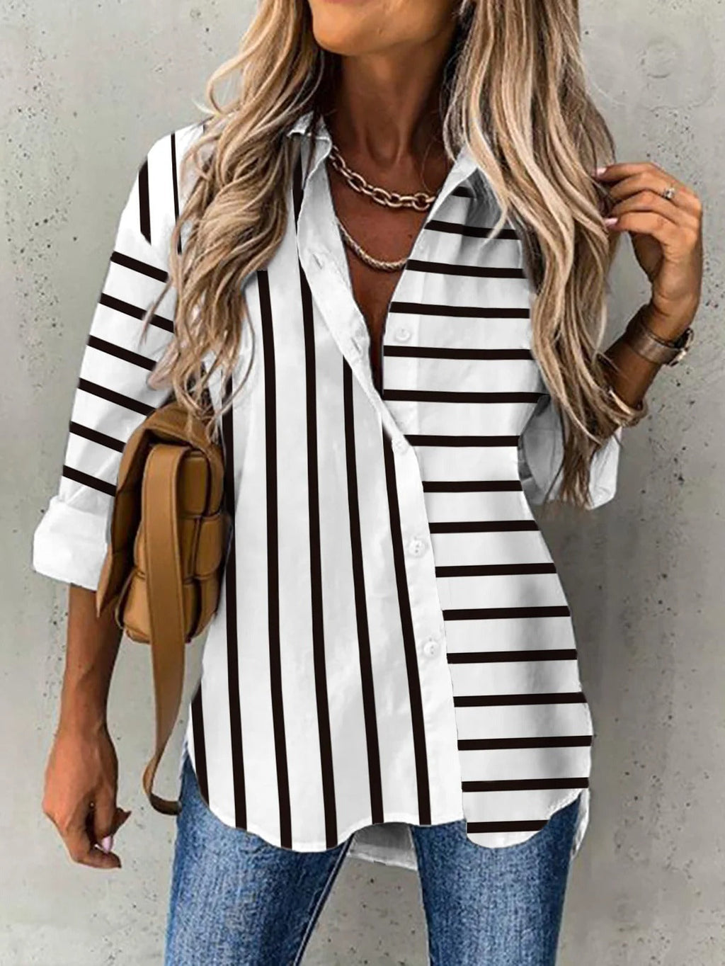 Blusa holgada de rayas con cuello camisero y manga larga