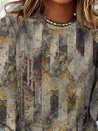 Blusa casual abstracta con cuello redondo y manga larga · Clara