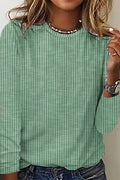 Camisa moderna de rayas con cuello redondo y manga larga