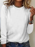 Blusa lisa de mezcla de algodón con cuello redondo y manga larga