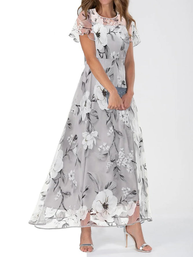Vestido largo holgado de flores con cuello redondo y manga corta