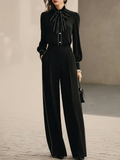 Ana Conjunto de Dos Piezas: Blusa Negra con Lazo y Ribete Blanco y Pantalón Ancho