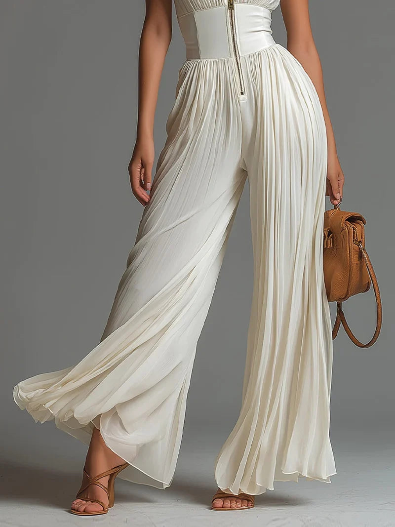 Arcelia Mono Blanco de Chiffon sin Mangas con Cremallera, Pliegues y Pernera Ancha