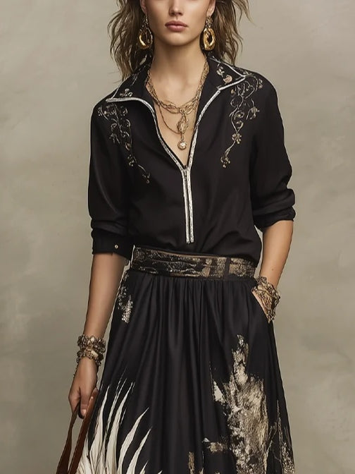 Fátima Conjunto de Camisa con Media Cremallera y Estampado Artístico Negro y Dorado y Falda Midi Floral Fluida