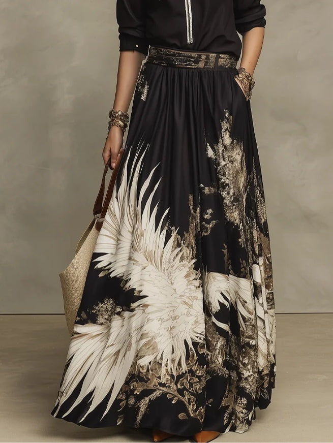 Fátima Conjunto de Camisa con Media Cremallera y Estampado Artístico Negro y Dorado y Falda Midi Floral Fluida