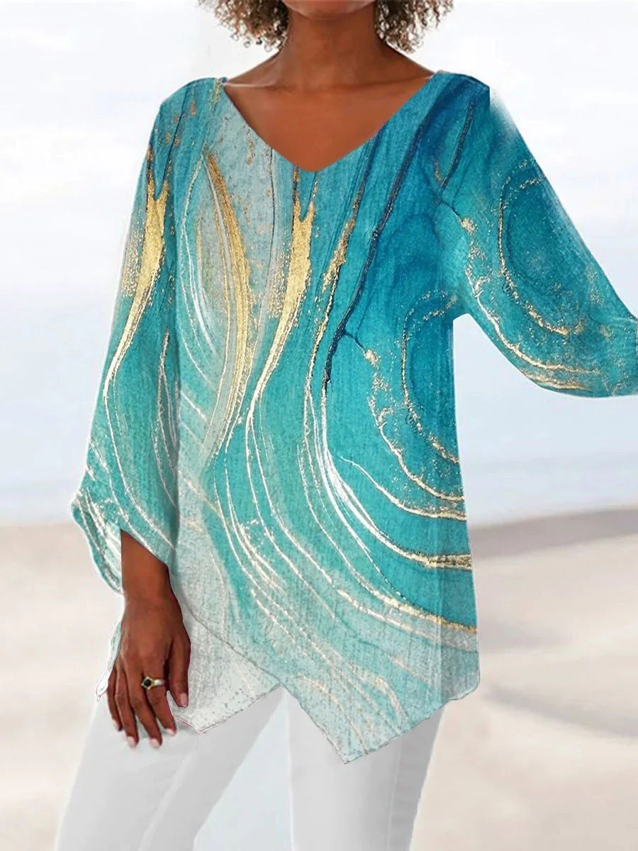 Blusa asimétrica efecto mármol con escote en pico y manga larga