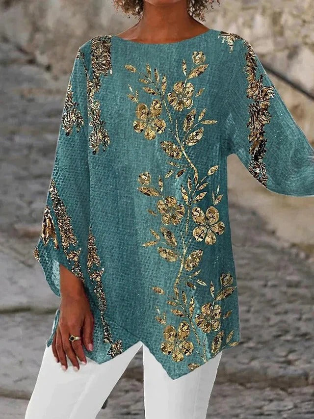 Blusa de flores dorada con cuello redondo y manga larga