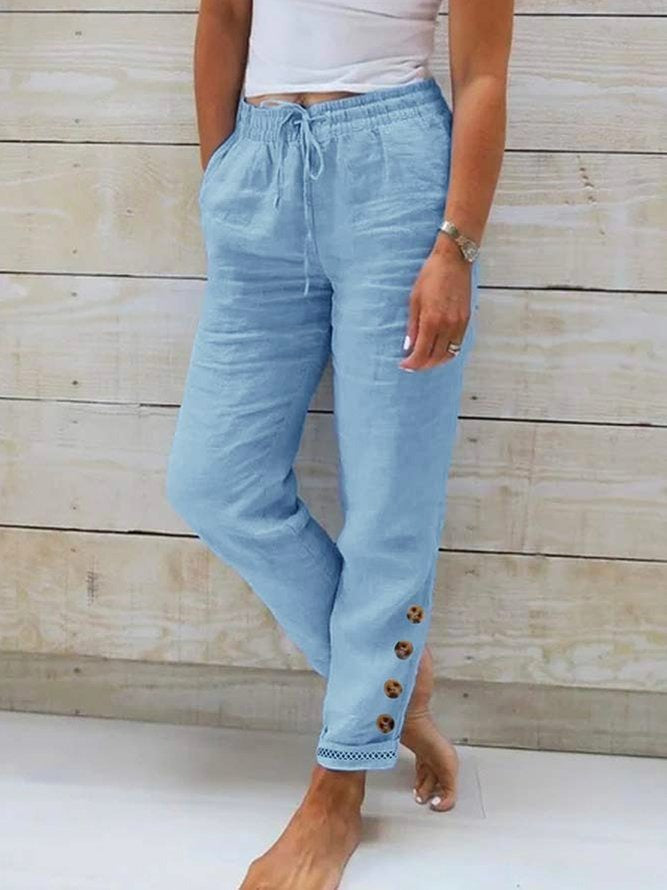Pantalón casual liso azul con botones