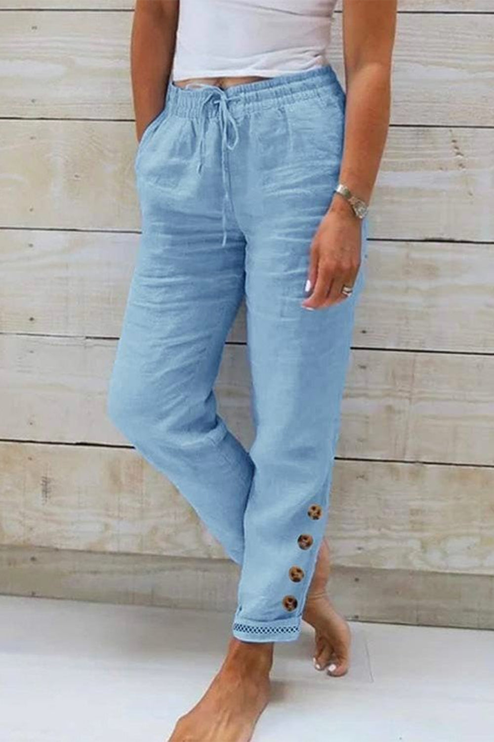 Pantalón casual liso azul con botones — foto 2