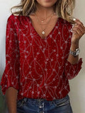 Blusa casual estampada roja con escote en pico, sin mangas