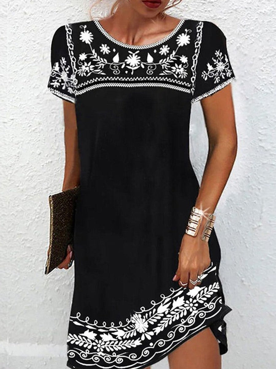 Vestido corto de flores negro con cuello redondo y manga corta