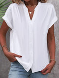 Camisa cómoda lisa con escote en pico, manga corta y botones