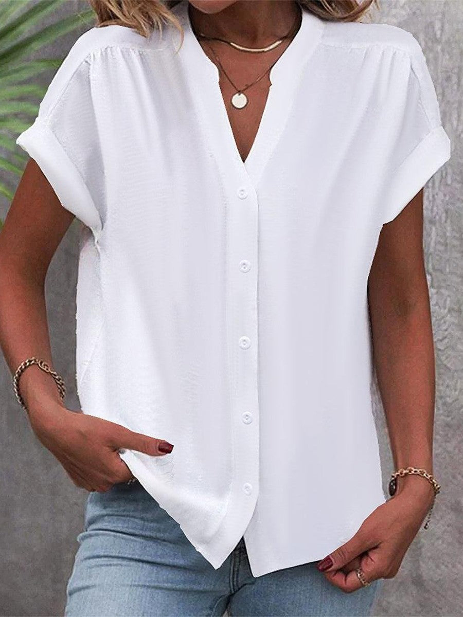 Camisa cómoda lisa con escote en pico, manga corta y botones