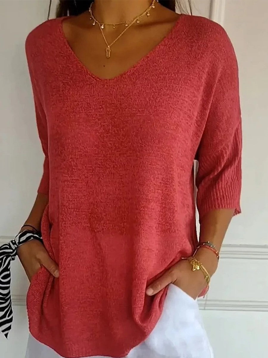 Jersey liso de punto con escote en pico