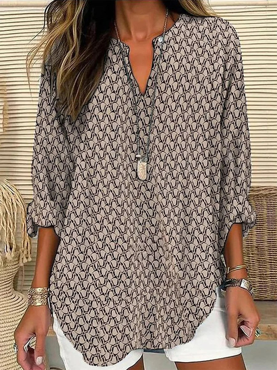 Camisa holgada geométrica con escote en pico y manga larga