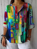Blusa holgada geométrica con escote en pico y manga larga