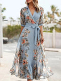Vestido midi azul con escote en pico y manga corta · Gia