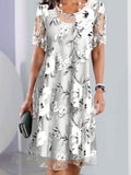 Vestido elegante midi de flores con cuello redondo y manga corta