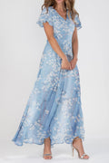 Vestido largo de flores con escote en pico y manga corta · Nia