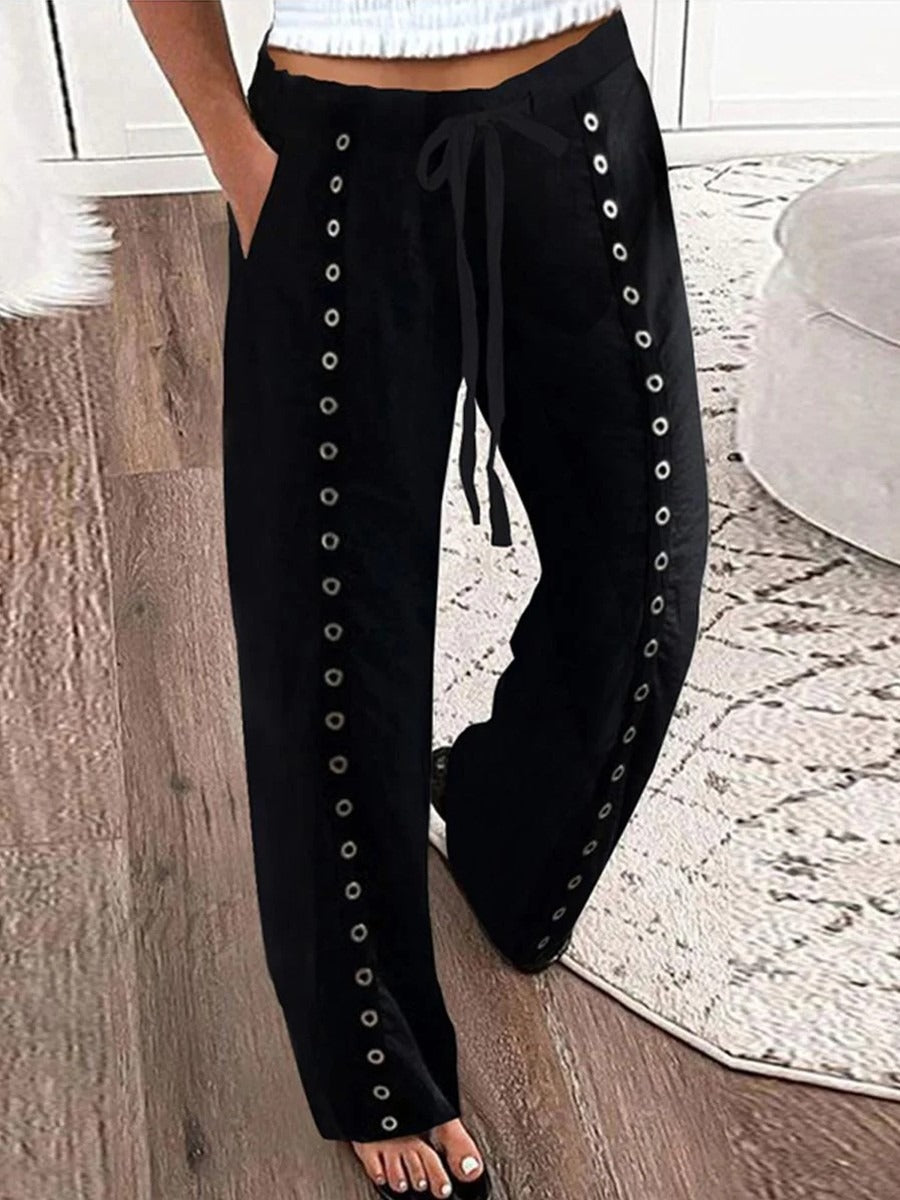 Pantalón casual negro con lazada en la cintura