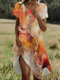 Vestido midi efecto acuarela con escote en pico y manga corta