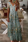 Vestido largo de flores con escote en pico y manga corta