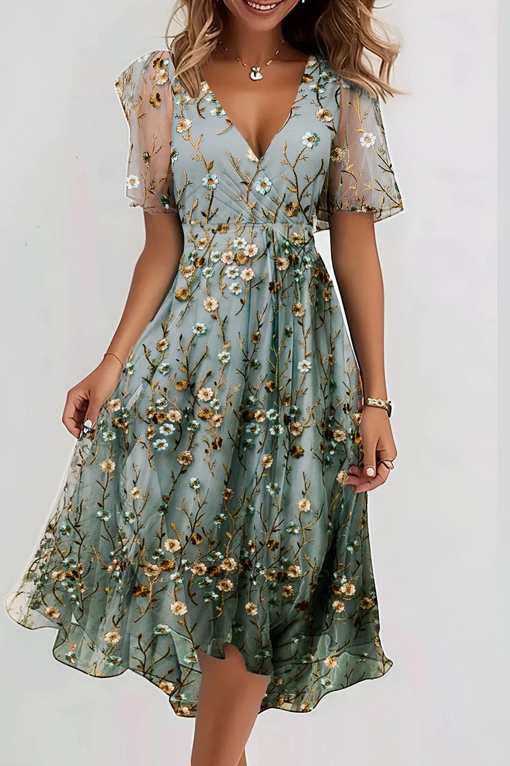 Vestido elegante midi de flores con escote en pico y manga corta