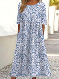 Vestido midi de flores con cuello redondo y manga corta