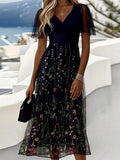 Vestido elegante midi de flores con escote en pico y manga corta · Valeria