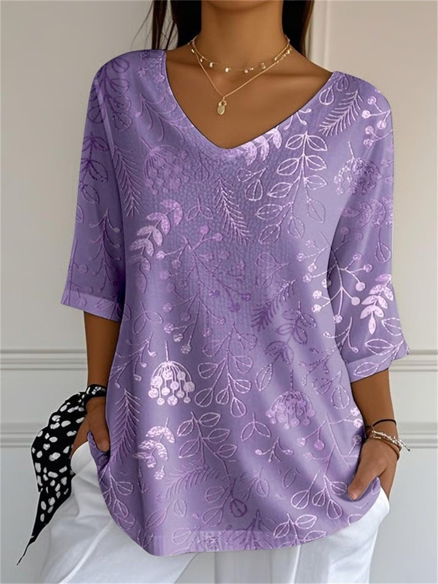 Camisa de flores morada con escote en pico