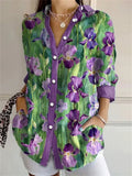 Top de flores morado con escote en pico y manga larga