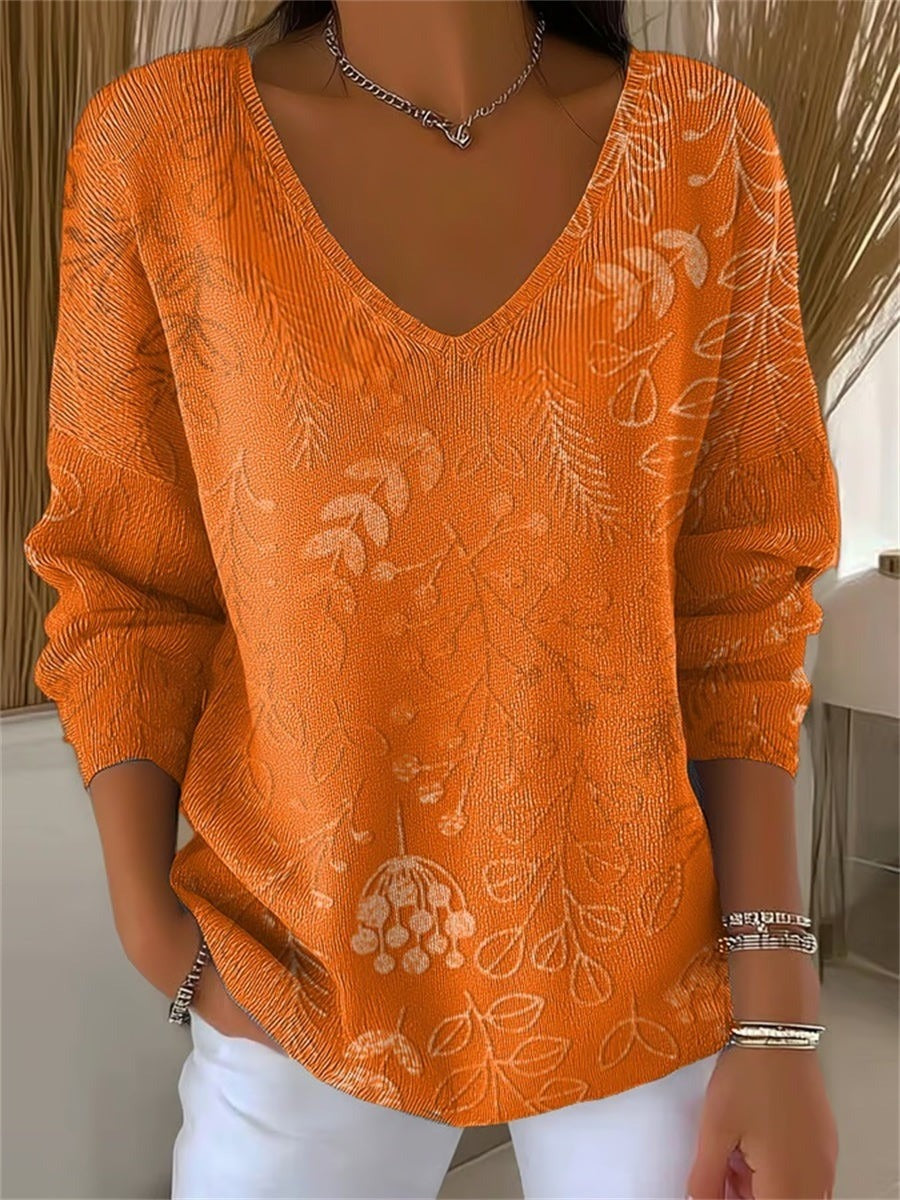 Jersey holgado de hojas con escote en pico y manga larga