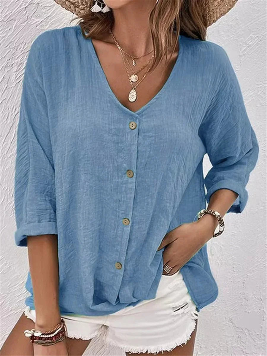 Camisa holgada con escote en pico y manga corta