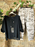Conjunto casual de dos piezas negro con cuello redondo y manga francesa