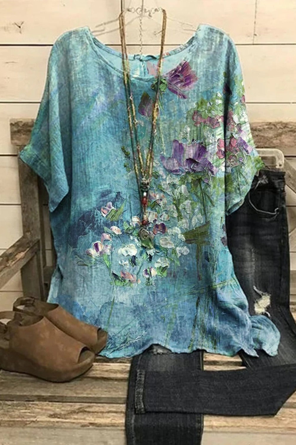 Top casual de flores con cuello redondo y manga corta · Jara