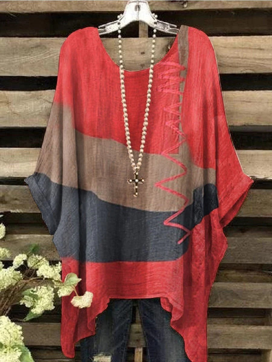 Blusa casual asimétrica bicolor con cuello redondo y manga larga