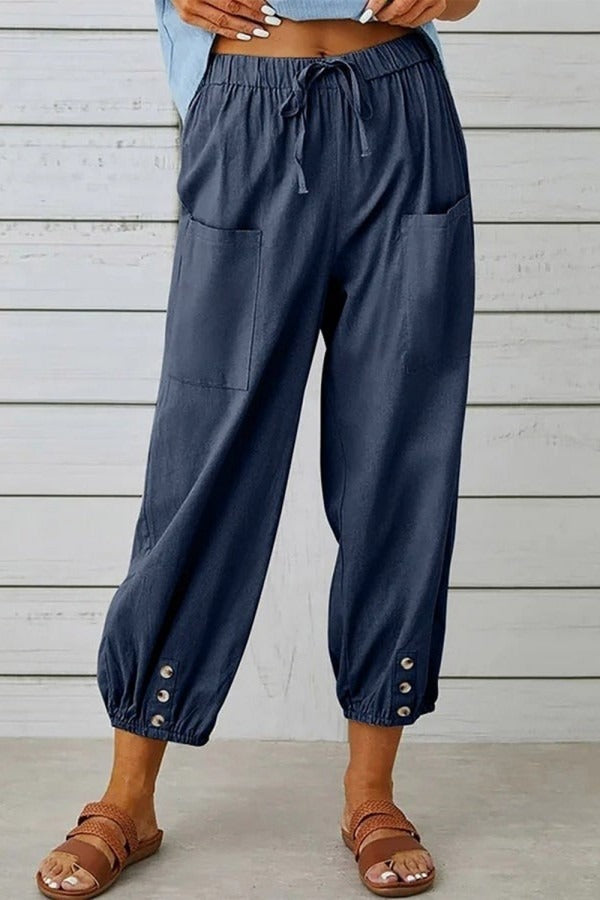 Pantalón casual liso con bolsillos y botones · Freya