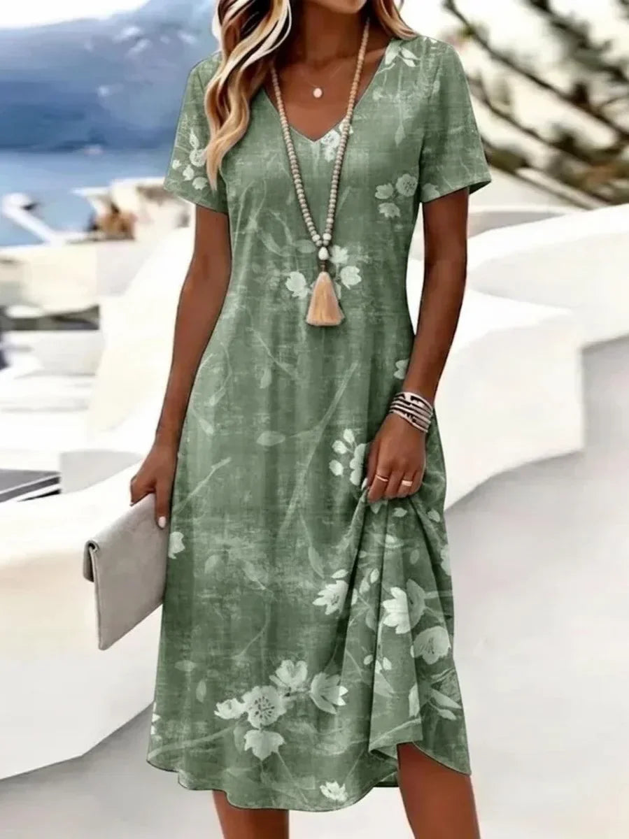 Vestido de línea A de flores con escote en pico y manga corta