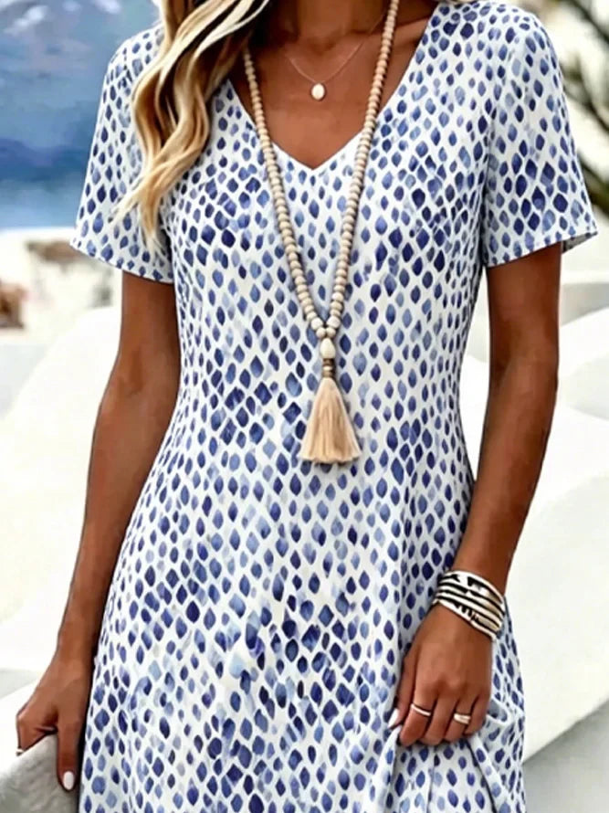 Vestido de línea A efecto acuarela con escote en pico y manga corta — foto 2