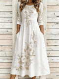 Vestido largo de flores con cuello redondo y manga tres cuartos