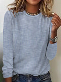 Blusa de rayas con cuello redondo y manga larga · Yanira